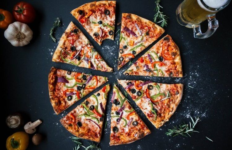 Pizza, uno de los platos que debes probar en los restaurantes en Pisa